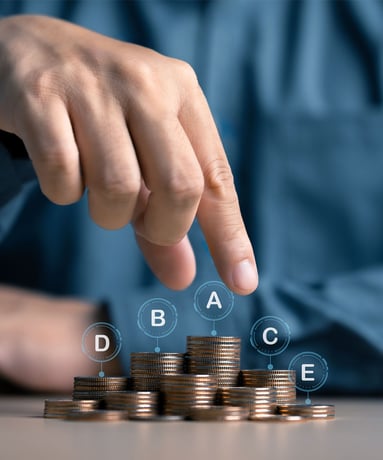hand rearranging coins to illustrate financial portfolio diversification