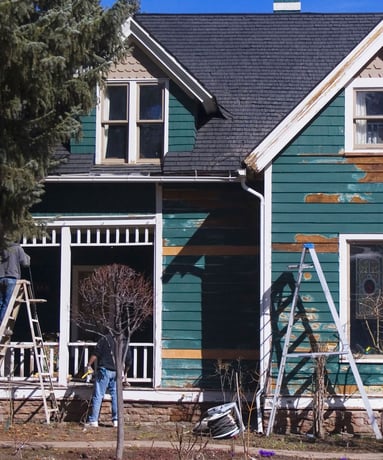 sanding and painting home exterior